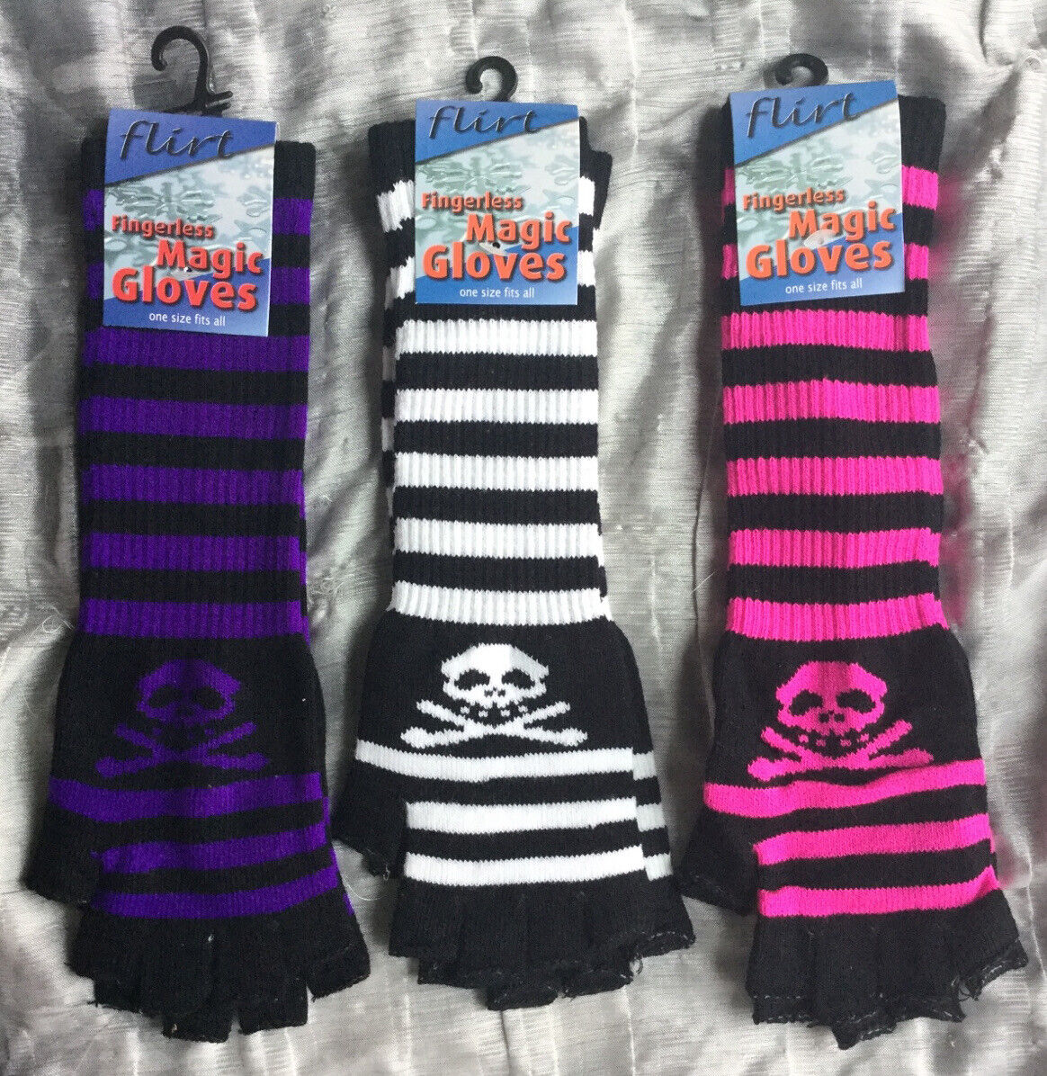 84 PAIRS OF GLOVEs LONG FINGERLESS BLACK/PIRATE/SKULL MAGIC ONE SIZE WHOLESALE LOT