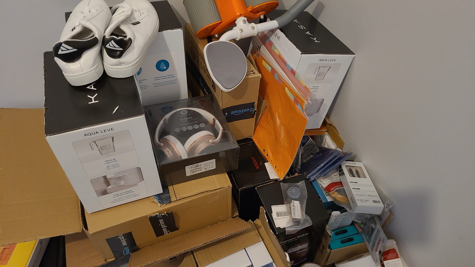 Mix lot of water filter jugs headphone mobile charging cables cosmetics office stationery items mobile phone accessories all together approximately 50