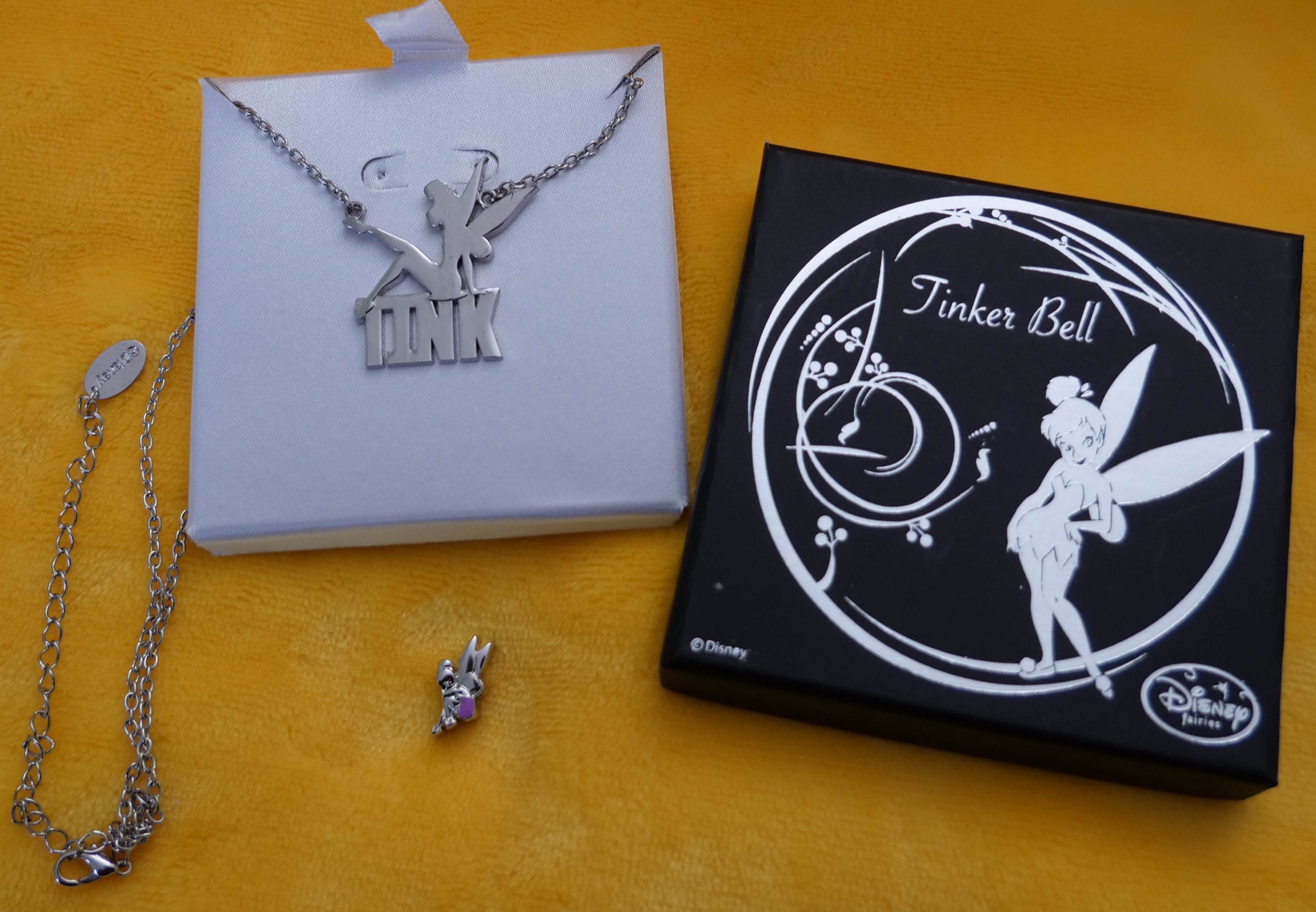 60 Genuine Disney Tinkerbell items of Jewellery Pendants and Charms RRP £800.40