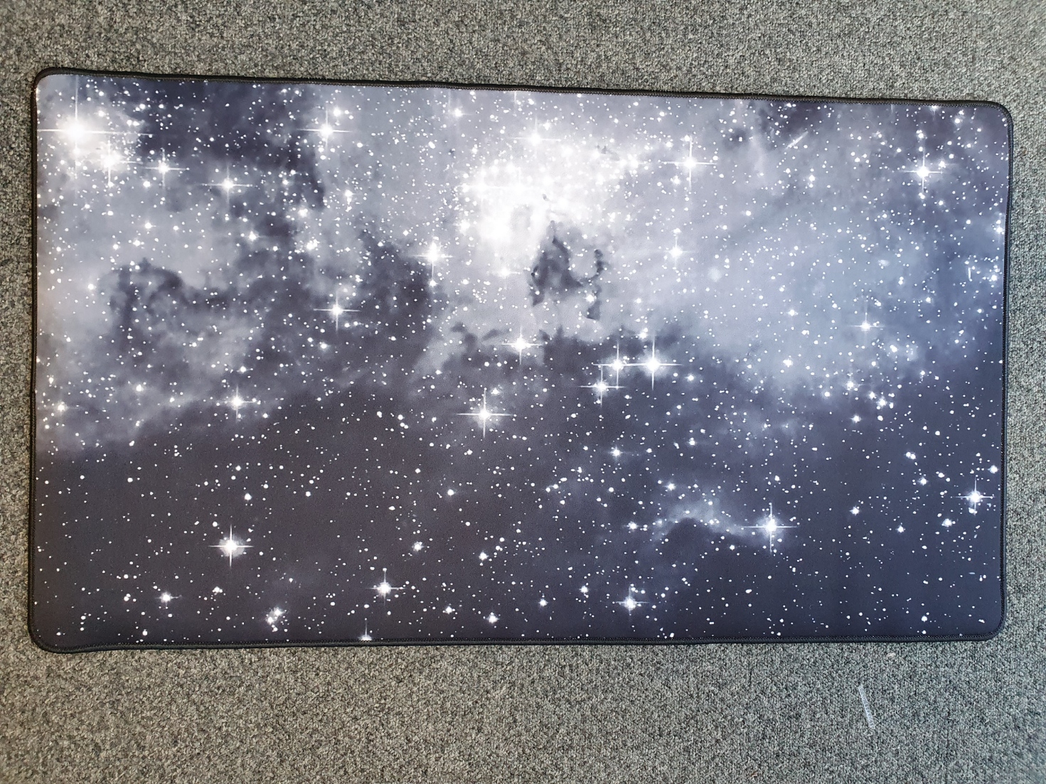 Box of 50 Large 70 x 40cm Desk Mats - Galaxy / Marble / Plain Black Design